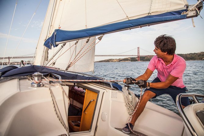 2,5h Lisbon Sunset Sail with Drinks and Snacks - Going beneath the 25 de Abril Bridge