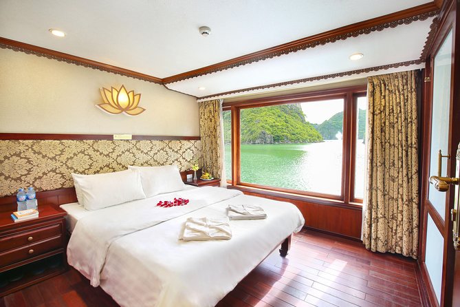 2-Day Oriental Sails Junk Cruise of Halong Bay - Day two begins with tai chi and coffee