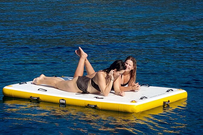 6 hours sailing tour with audio guides and typical Sardinian cuisine - Swimming, snorkeling, and time on deck