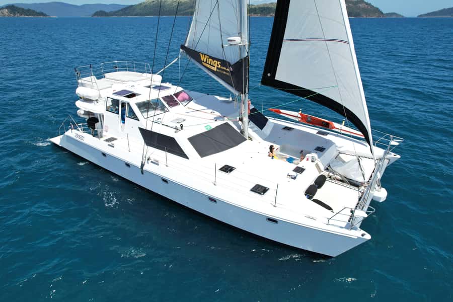 Airlie Beach: Whitsunday Islands Sailing, SUP & Snorkel Tour - A polished sailing day from Coral Sea Marina