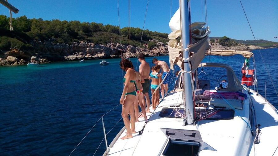 Alghero: Daily Sailing Experience with lunch onboard - Swimming and snorkeling from the sailboat