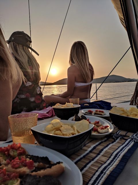 Alghero: Sunset Sailing Aperitif Experience - Aperitivo with Capo Caccia in the distance