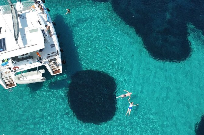 Athens Riviera Catamaran tour with fresh Meal Drinks and Swimming - A Greek meal with drinks on board