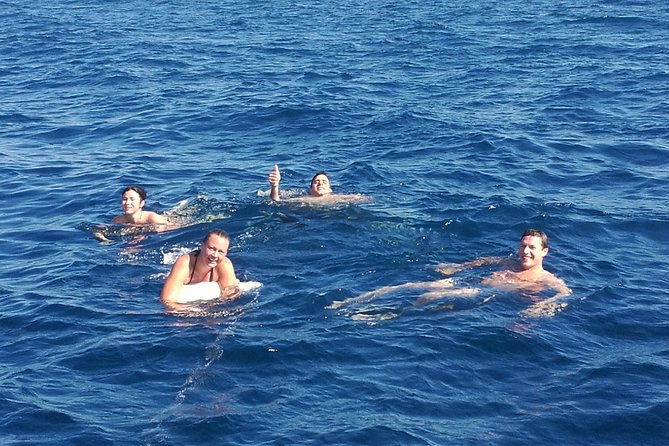 Authentic Barcelona Sailing Tour with Swim & Drinks - Port Vell, Columbus Monument, and the old harbor