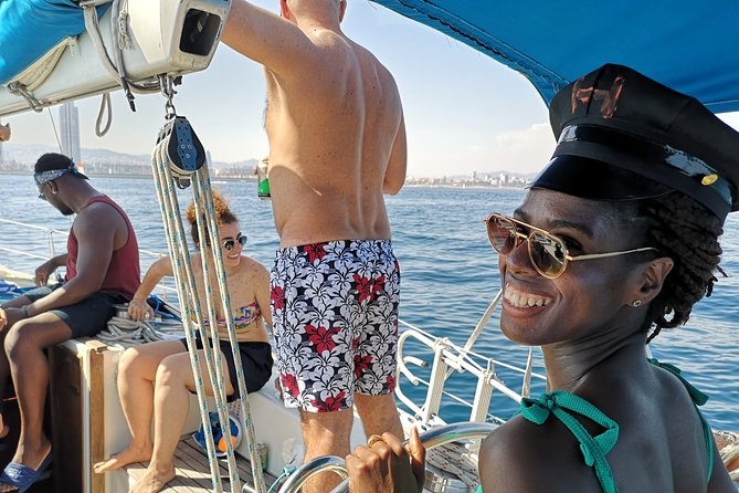 Authentic Barcelona Sailing Tour with Swim & Drinks - Drinks, snacks, and the feel onboard