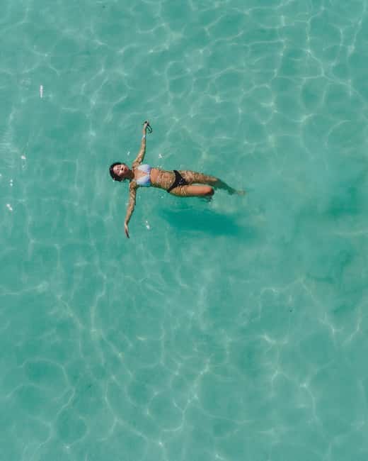 Bacalar Lagoon Sailing Tour with Open Bar and Mexican Lunch - Swimming stops and the clear water