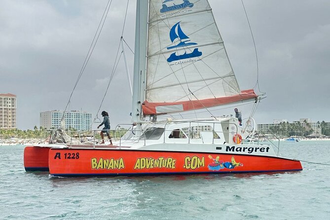 Banana Adventure Catamaran Tropical Sunset Sail - Sailing Aruba’s west coast at golden hour