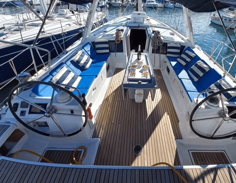 Barcelona: 2-Hour Sailboat Tour with Snacks and Drinks - Passing under the port drawbridge