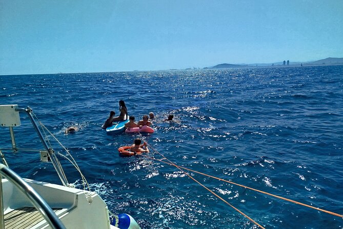 Barcelona Badalona Sailboat Tour Snack Drinks Swimming Sunset - Drinks, pica pica, and an easygoing pace