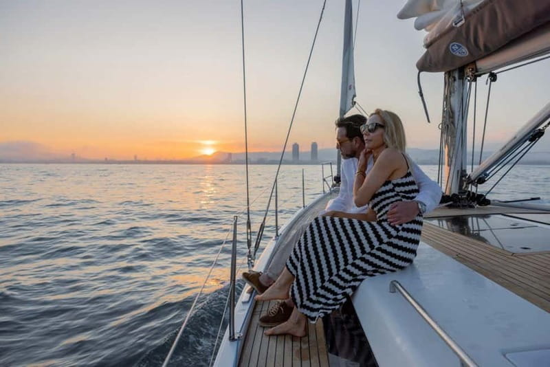 Barcelona: Luxury Sunset Sailboat Tour from Port Olimpic - The first views: Barceloneta, Hotel W, and Montjuic Castle