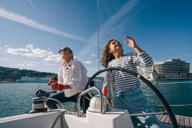 Barcelona: Mediterranean Sailing Experience with Open Bar - Barcelona’s skyline, with Sagrada Família in the distance