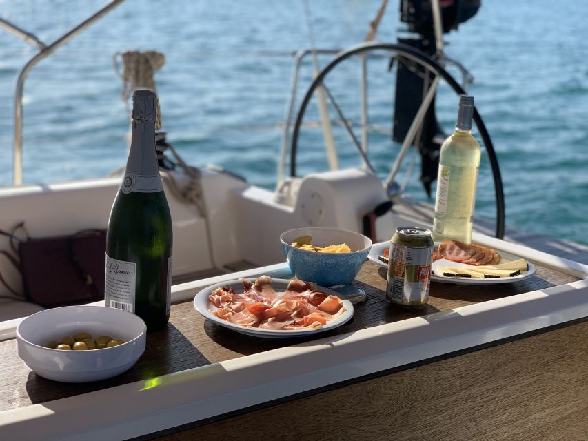 Barcelona: Midday or Sunset Sailing with Open Bar and Snacks - Drinks, snacks, and the open-bar value
