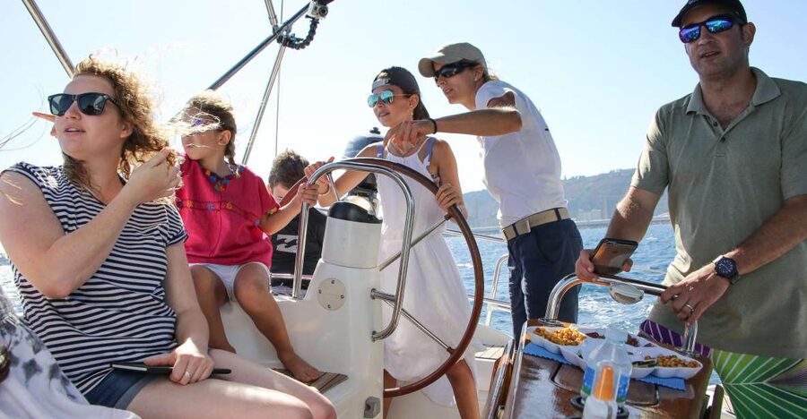 Barcelona: Sailing Tour with Spanish Tapas and Drinks - The Mediterranean swim stop