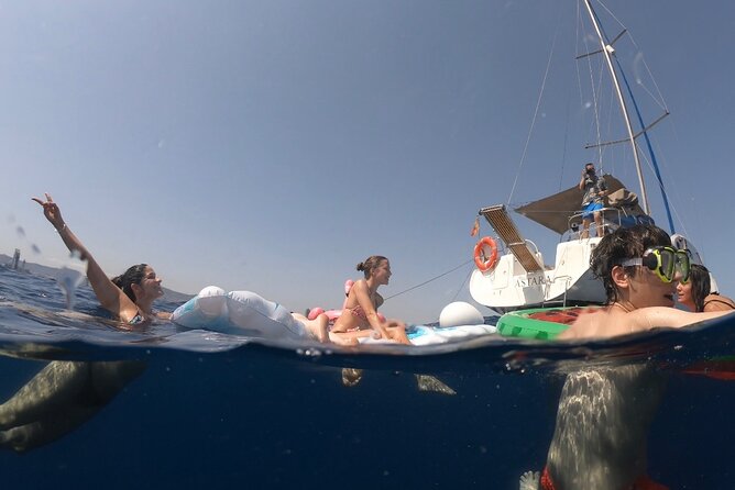 Barcelona Sailing Tour with Swimming, Snacks and Drinks - Snacks, drinks, and the real value of the price