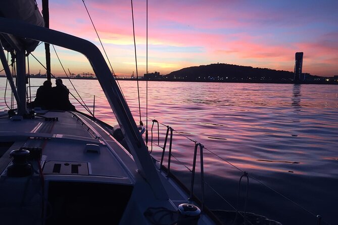 Barcelona: Sailing Tour with Tapas, Drinks, Swim & Sunset Option - The Mediterranean swim stop