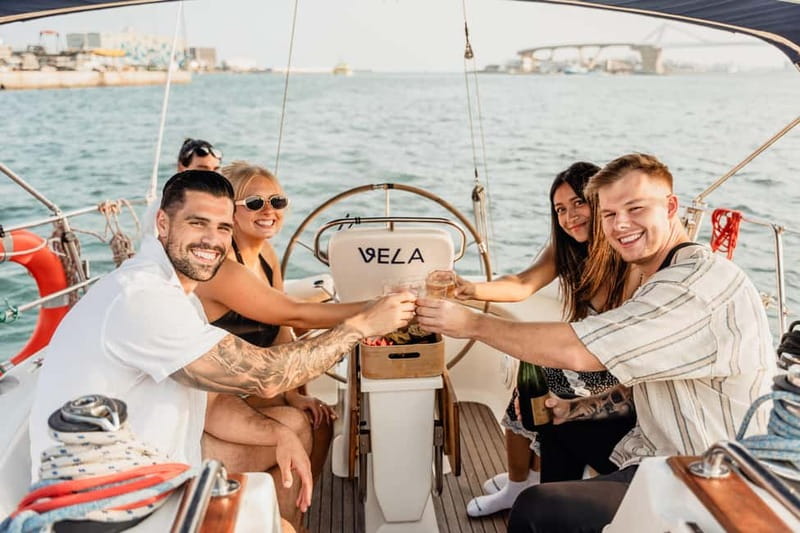 Barcelona: Sailing Tour with Young Local Captain & Drinks - The 40-minute viewpoint stop: drinks, swimming, and photos