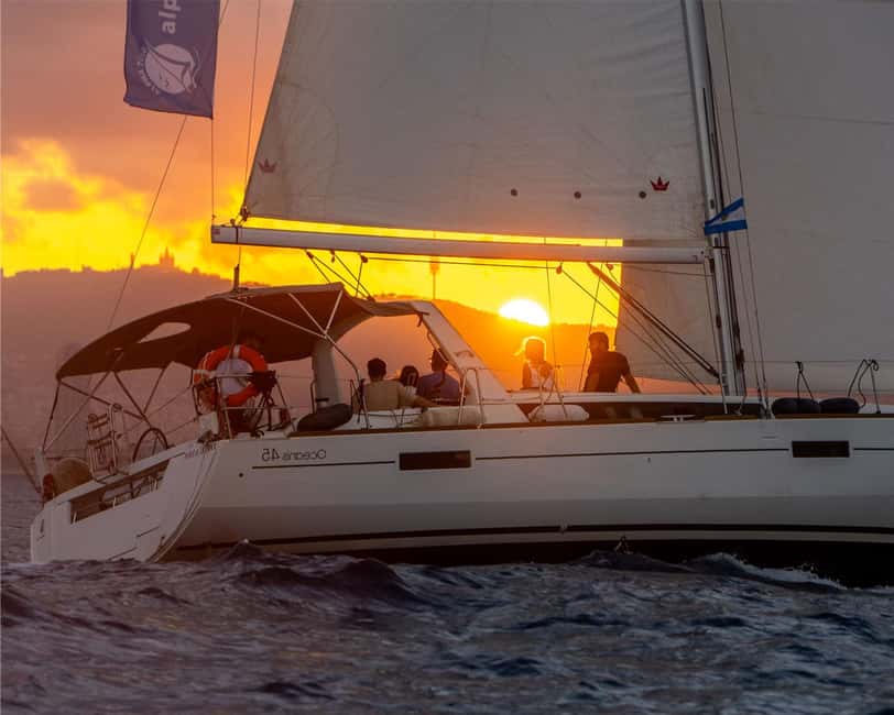 Barcelona: Sailing with Open Bar, Catalan Snack & Swim Stop - The swim stop near the beach