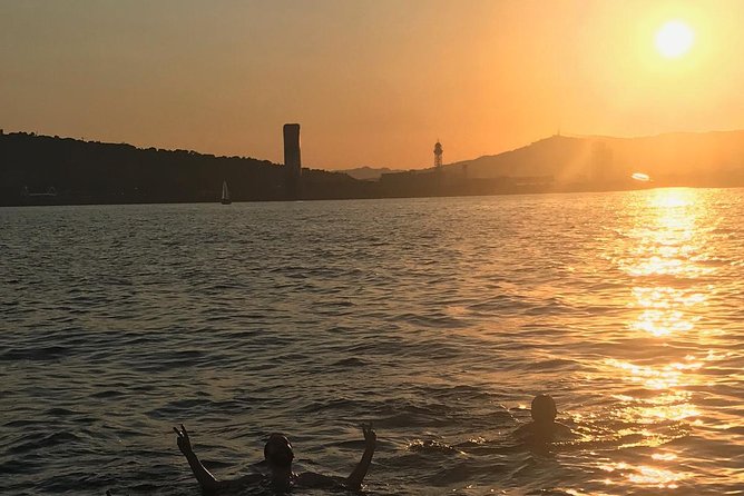 Barcelona Sunset and Day Sailing Cruise - Cava, Snacks, and the Option to Swim