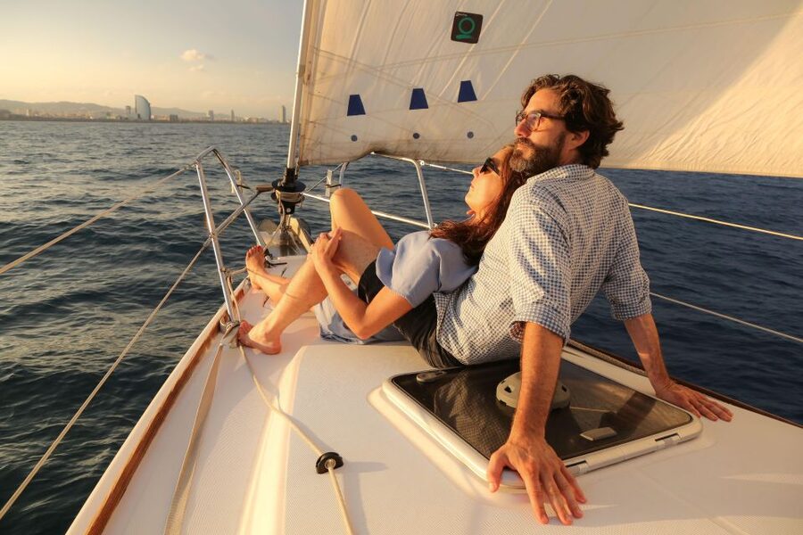 Barcelona: Sunset Live Sax and Sailing Experience with Tapas - Sailing away from Port Olimpic at sunset