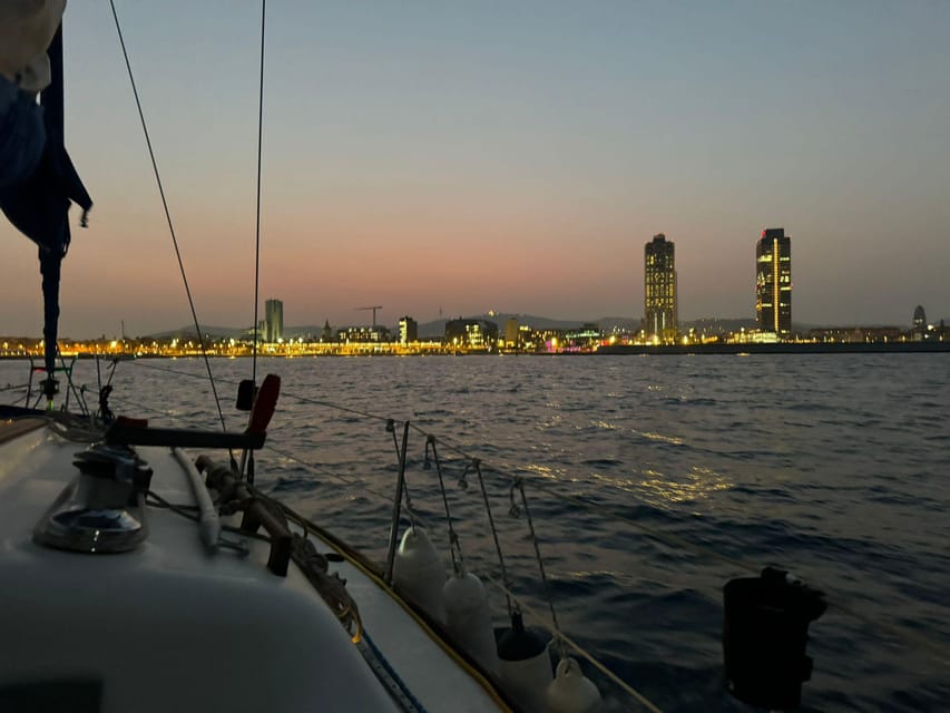 Barcelona: Sunset Sailboat Cruise with Drinks and Snacks - Drinks, snacks, and the onboard mood