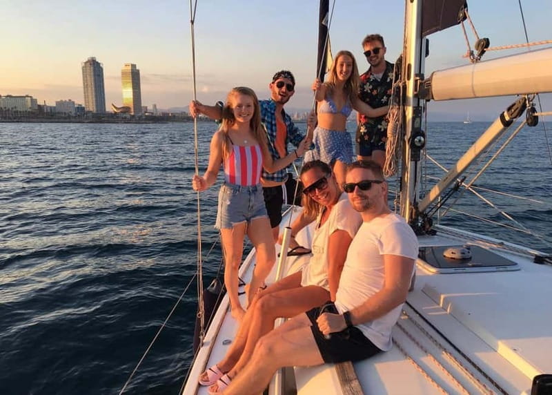 Barcelona: Sunset Sailboat Cruise with Open Bar and Snacks - An hour near Barceloneta Beach