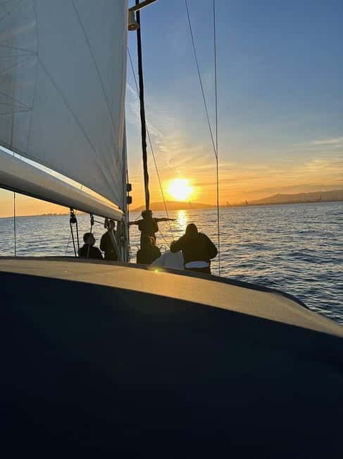 Barcelona: Sunset Sailboat Cruise with Open Bar and Snacks - What the open bar adds to the $46 price