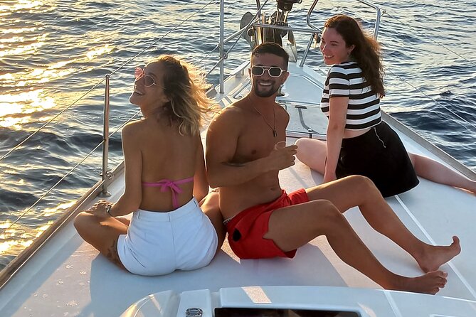 Barcelona Sunset Sailing Cruise from Port Olímpic with Open Bar - The Olympic Towers and Barcelona after dark