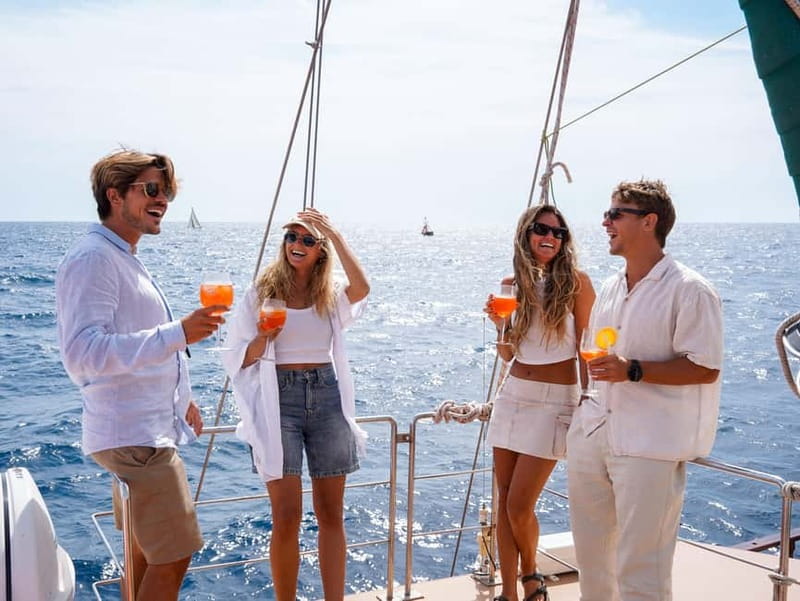 Barcelona: Sunset Sailing Cruise with Live Music - Sunset Timing and Conditions on the Water