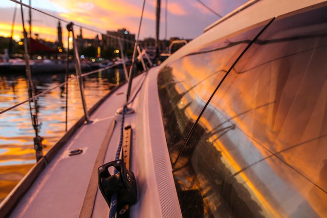 Barcelona Unique Sunset Sailing Experience with Tapas & Open Bar - Tapas, snacks, and what the food really means