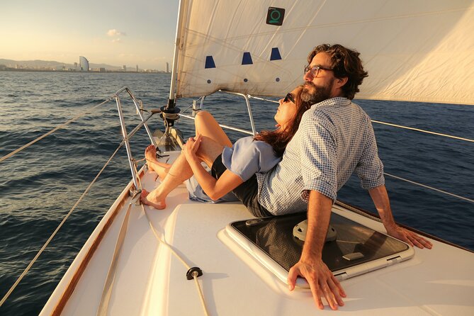Barcelona Unique Sunset Sailing Experience with Tapas & Open Bar - Passing Nova Icaria and the Barcelona beaches