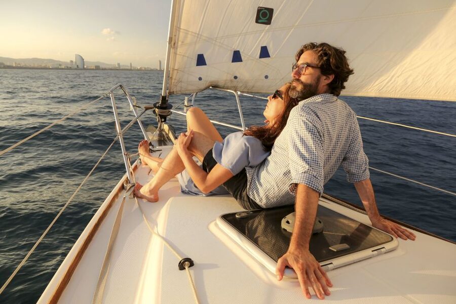 Barcelona: Unique Sunset Sailing Tour with Tapas & Open Bar - Leaving Port Olimpic as Barcelona cools down