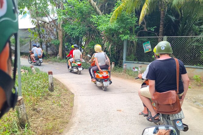 Ben Tre Mekong Zig Zag: Scooter, Sailboat, and Food (Full day) - The long Mekong lunch and hammock break