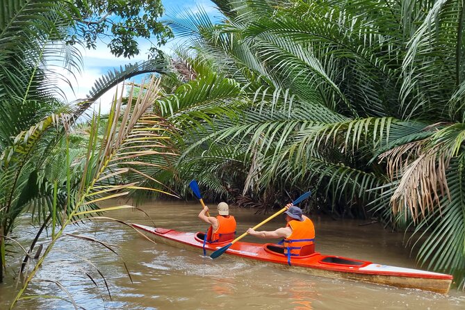 Ben Tre Mekong Zig Zag: Scooter, Sailboat, and Food (Full day) - Sailing a quiet tributary and shaded canal