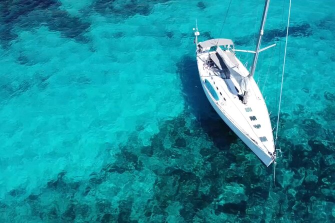 Best sailing adventure with Malta Sailing Experiences - Taking the wheel and learning the sailing rhythm