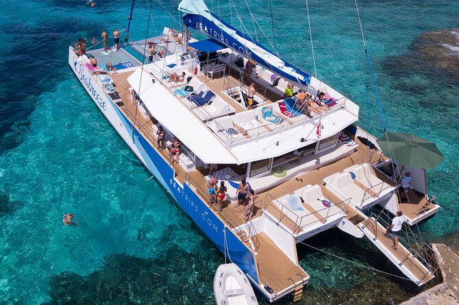 Blue Lagoon, Beaches and Bays Catamaran Sailing Tour - Mellieha Beach, Ramla Bay, and changing plans