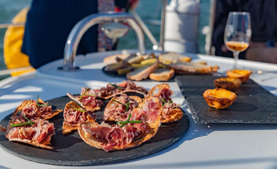 ⛵Bluemotion Lisbon⛵: Wine tasting w/ Sommelier on a sailboat - Commerce Square and Alfama from the river