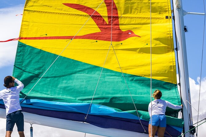 Board from Waikiki Beach for a scenic Sunset Sail on the Hāwea - Drinks, music, and the onboard mood