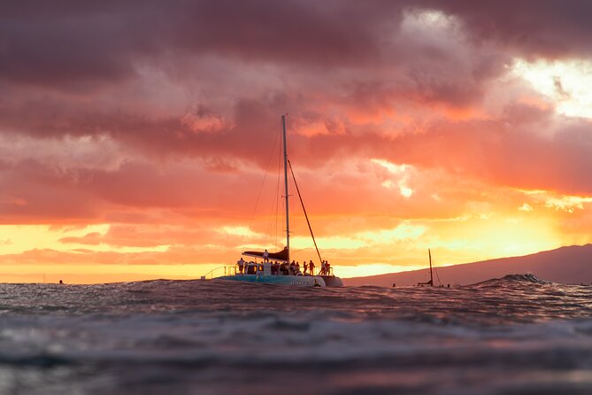 Board from Waikiki Beach for a scenic Sunset Sail on the Hāwea - The wet-foot boarding process