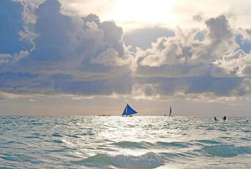 Boracay: Sunset Paraw Sailing Trip - Leaving the beach and sailing around the bay