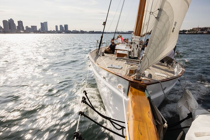 Boston Harbor Sunset Sail Tour - Dress for the wind, even on a warm day