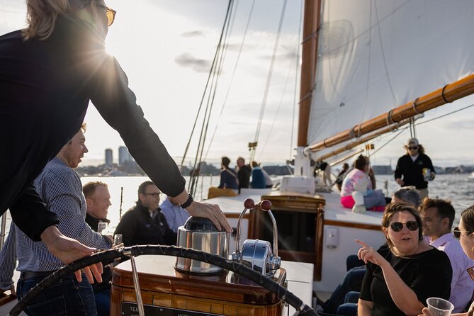 Boston Harbor Sunset Sail Tour - The Seaport skyline at golden hour