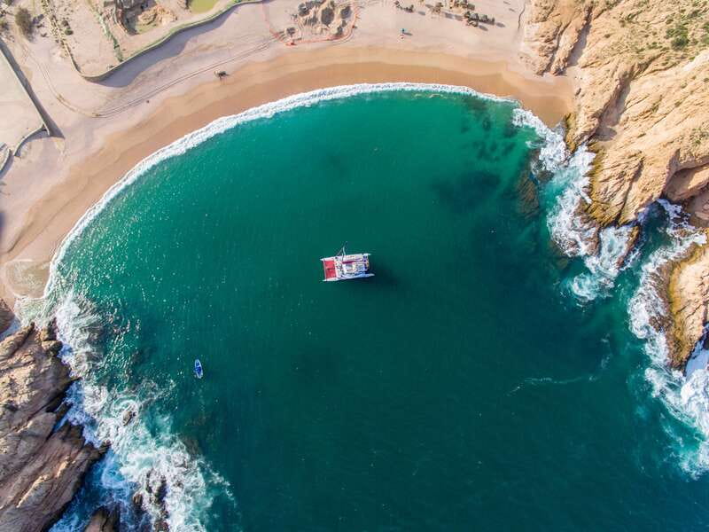 Cabo San Lucas: Snorkel, Lunch and Sail Experience - Sailing, Sun Nets, and the Party Atmosphere