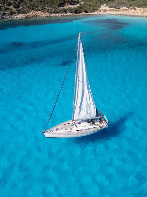 Cagliari: Mari Pintau Sailing Trip with Lunch & Snorkeling - The first coastal views: Cala Bernat, Cala Mosca, and Cala Fighera
