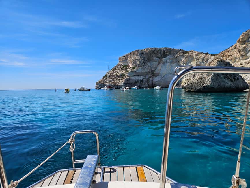 Cagliari Sailing Boat Tour with Snorkeling and Drink - Looking for fish, cormorants, and dolphins