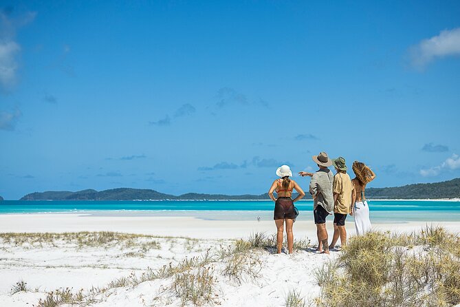 Camira Sailing Adventure through Whitsunday Islands - Sailing back with food, drinks, and island views