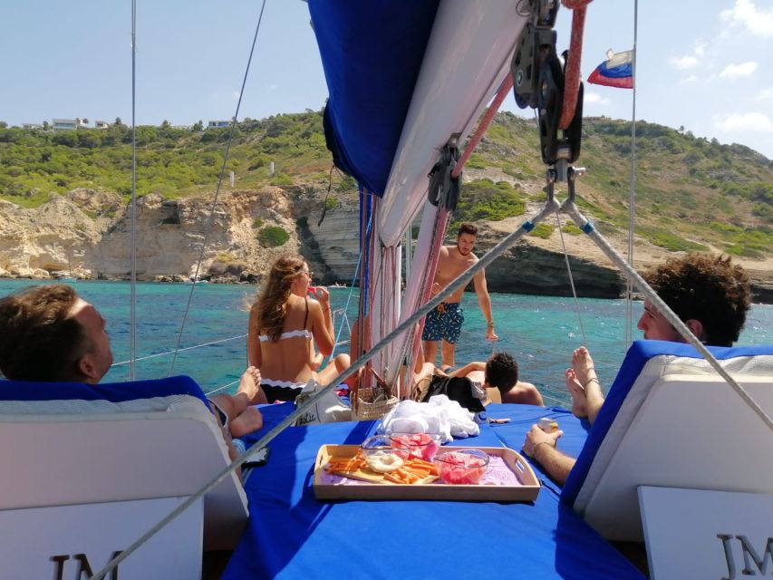 Can Pastilla: Sailboat Tour with Snorkeling, Tapas & Drinks - Tapas, cava and the food on board