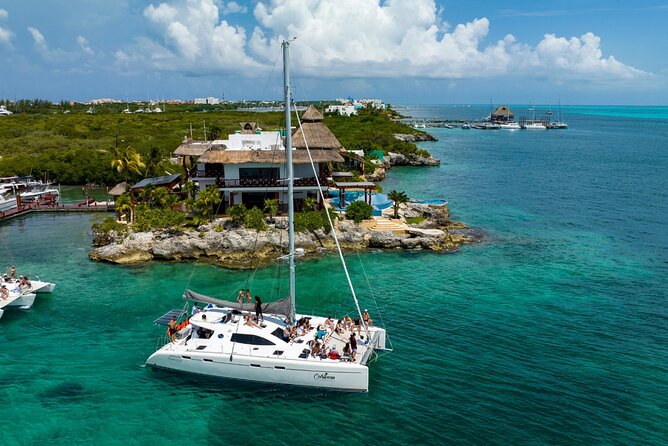 Cancun Catamaran: Sail to Isla Mujeres + Buffet & Drinks - From Playa Tortugas to the open Caribbean