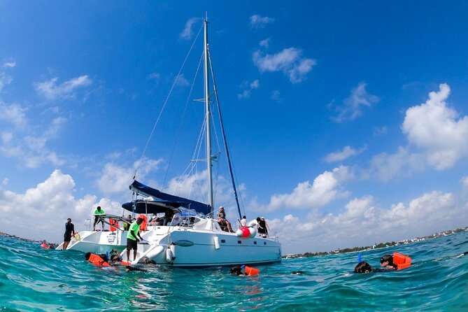 Cancun Sailing Catamaran Islas Mujeres With Luxury Beach Club - El Meco Reef and the 35-minute snorkel stop