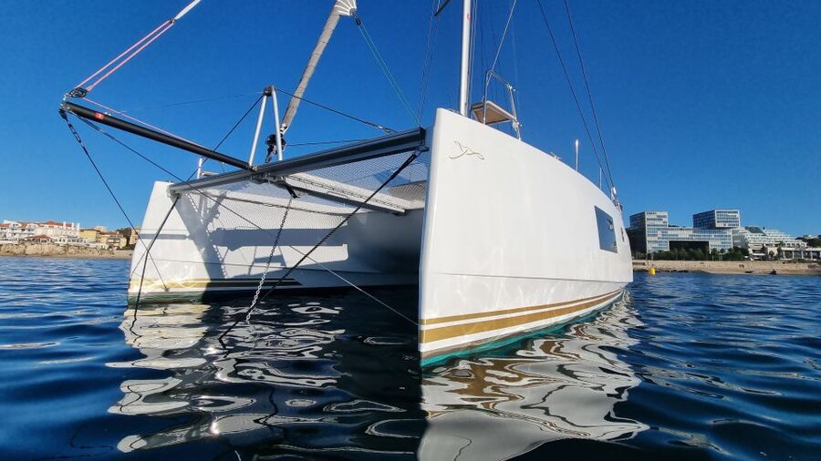 Cascais:Luxury Private Sailing Catamaran Cruise with a Drink - Passing the coastal forts by catamaran