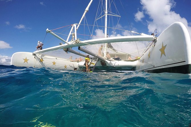 Catamaran Day Trip, Snorkeling & Sailing Excursion - Boarding the 75-foot catamaran